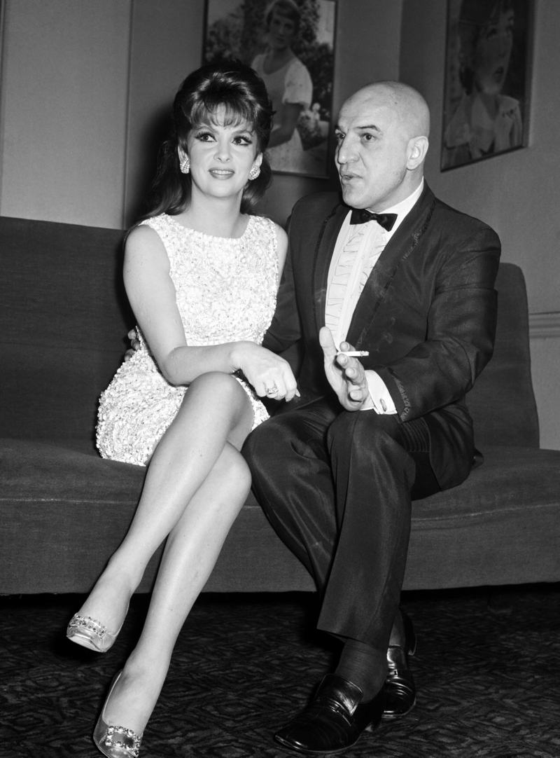 teli-savalas-4.jpg Ο Τέλι Σαβάλας με την Ιταλίδα σταρ Τζίνα Λολομπρίτζιτα / AP Images